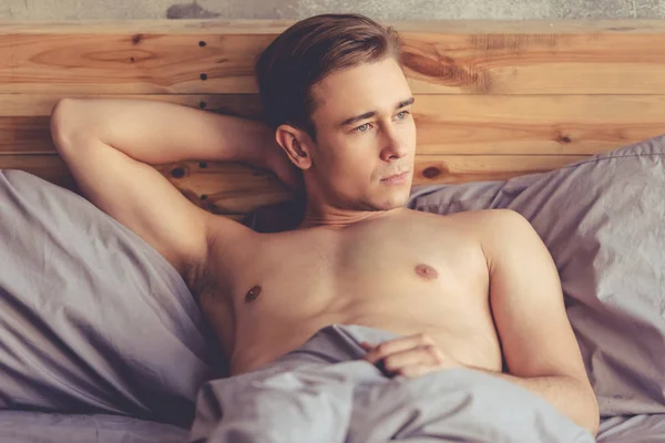 Sexy man in bedroom — Stock Photo, Image