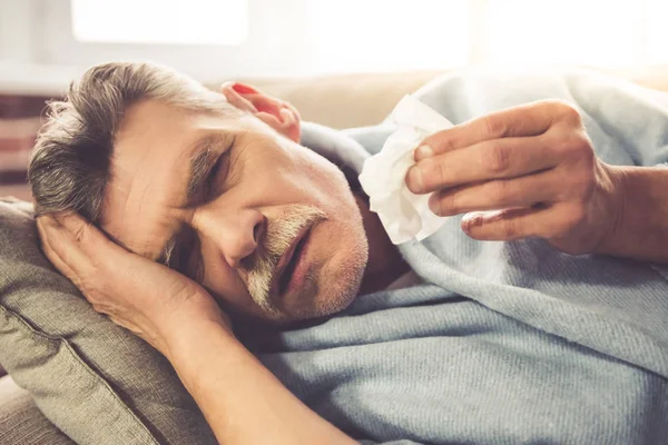 Mature man having a cold — Stock Photo, Image