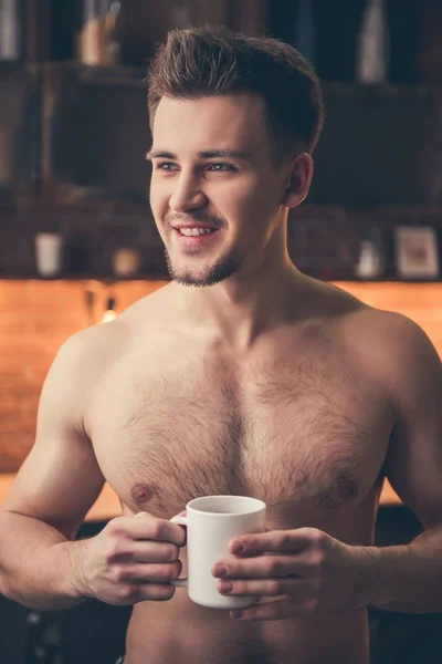 Sexy guy in the kitchen — Stock Photo, Image