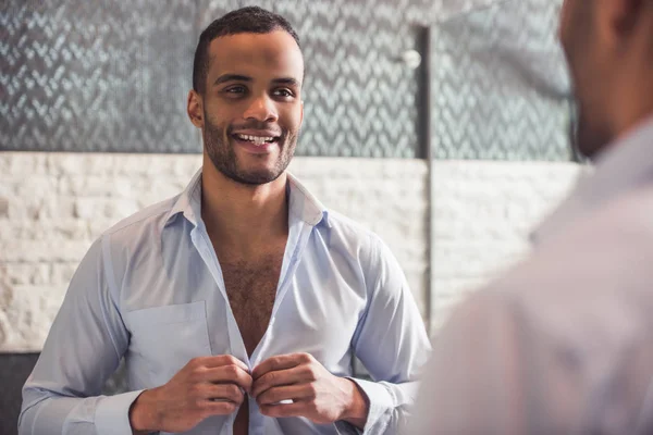 Afro American man in bathroom — Stock Photo, Image