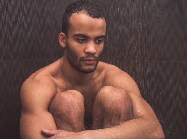 Afro American man taking shower — Stock Photo, Image