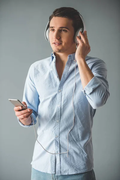 Handsome guy in headphones — Stock Photo, Image
