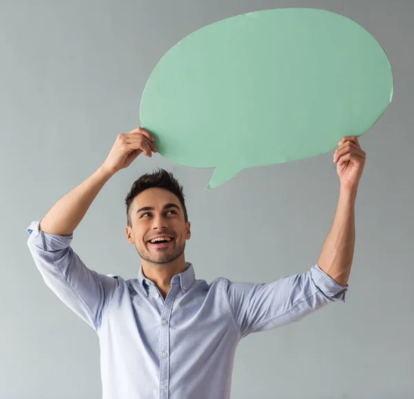 Handsome guy with speech bubble — Stock Photo, Image