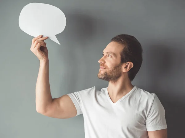 Handsome man with speech bubble — Stock Photo, Image