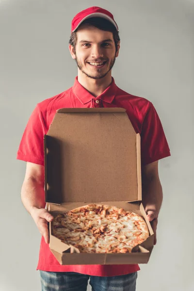 Handsome young delivery worker — Stock Photo, Image