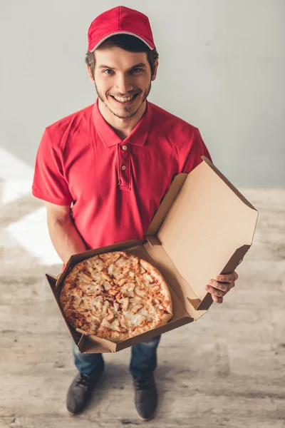 Handsome young delivery worker — Stock Photo, Image