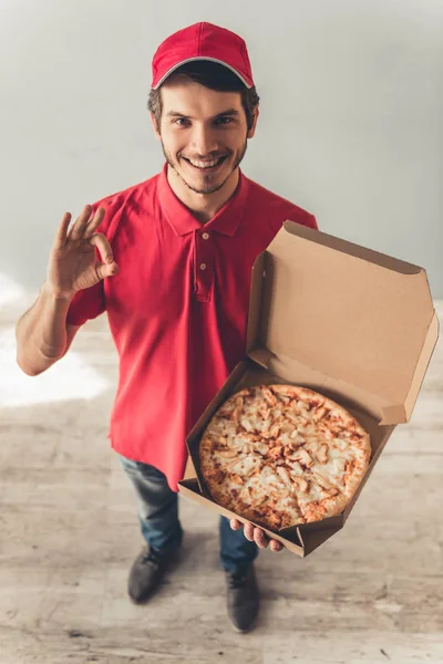 Handsome young delivery worker — Stock Photo, Image