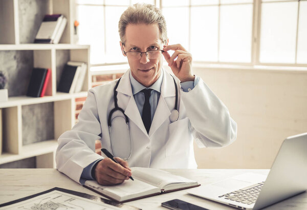 Handsome mature doctor