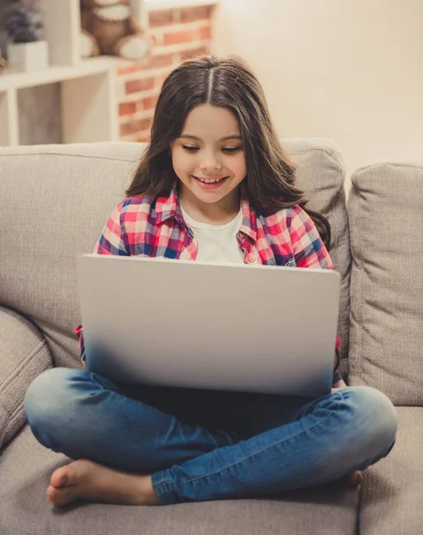 Little girl with laptop — Stock Photo, Image