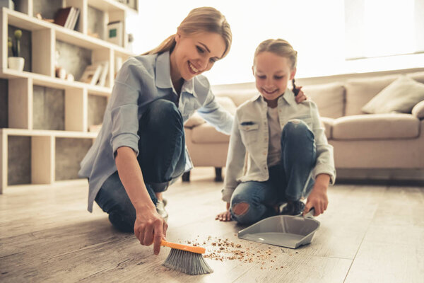 Mom and daughter cleaning