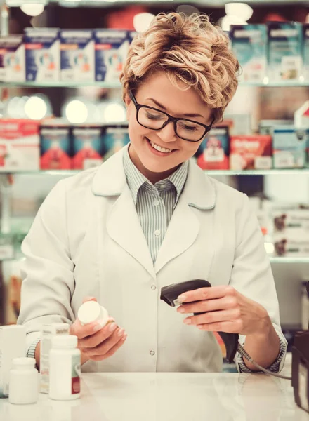 Beautiful pharmacist at work — Stock Photo, Image