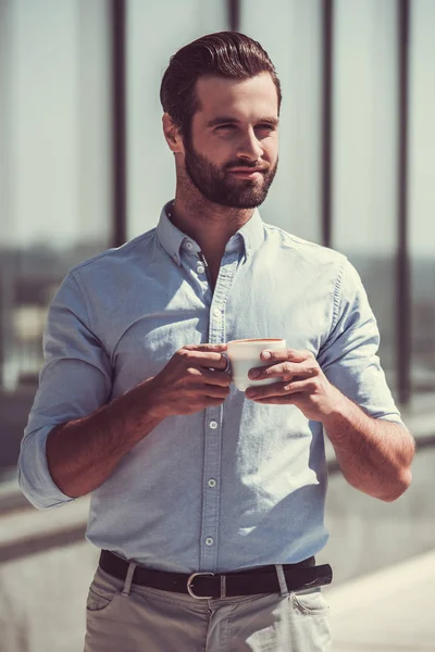 Handsome businessman outdoors — Stock Photo, Image