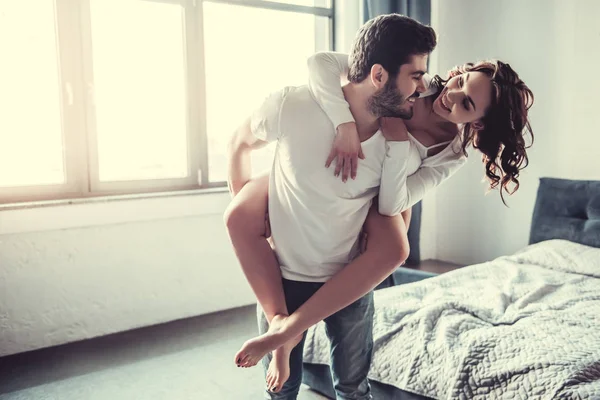 Couple in bedroom — Stock Photo, Image