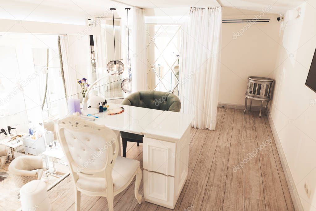 Exquisite beauty salon with a stylish interior. Photo of an interior of a beauty salon without people.