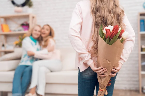 Little Girl Gives Bouquet Tulips Her Mom Grandmother Celebrate Mothers — Stock Photo, Image