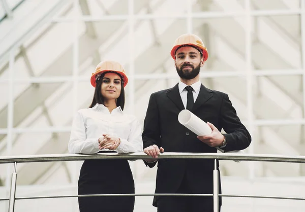 Young male and female architect in the modern office — Stock Photo, Image