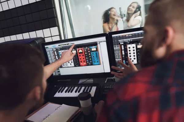 Two Girls Sing Recording Studio Console Two Sound Engineers Sitting —  Fotos de Stock