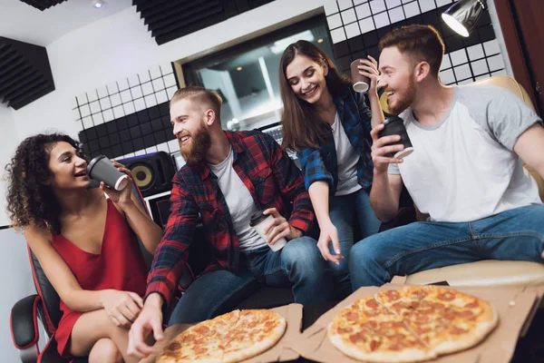 Two Men Two Women Recording Studio Eating Pizza Rest Recording Stock Picture