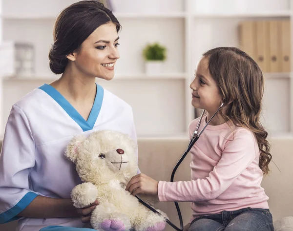 Little girl in a doctor