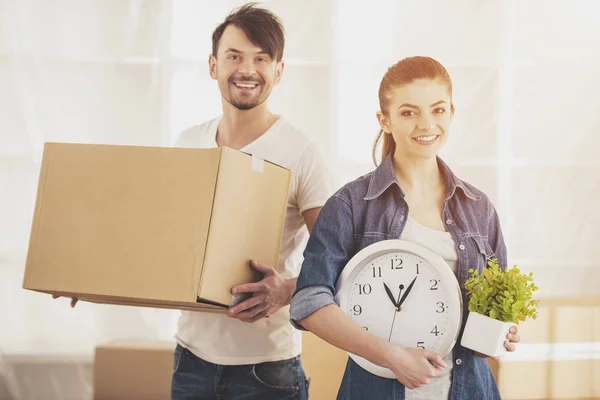 The young happy couple. Moving, purchase of new habitation — Stock Photo, Image
