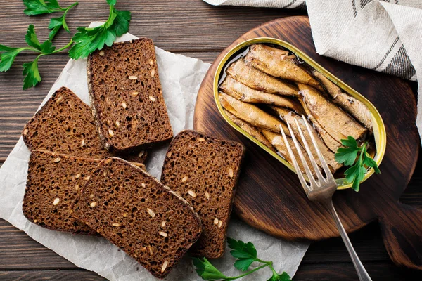 Canned Sprats Tin Can Fork Bread Making Sandwich Dark Brown — Stock Photo, Image