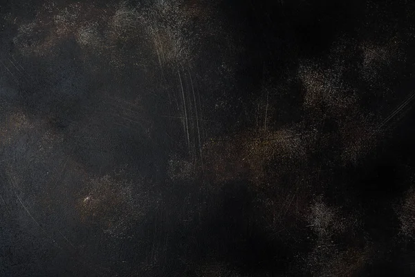 Koyu kahverengi taş veya kayrak duvar. Grunge doku arka plan.
