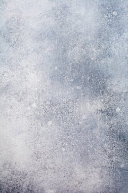 Açık gri taş ya da tahta duvar. Grunge arka planı. Üst manzara..
