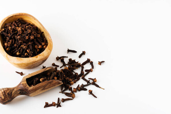 Cloves. Dry seasoning for cooking and drinks isolated on a white background.