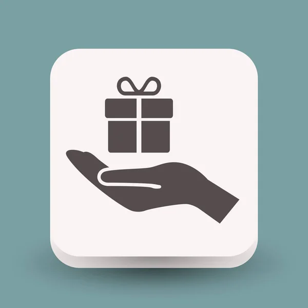 Gift box on hand icon — Stock Vector