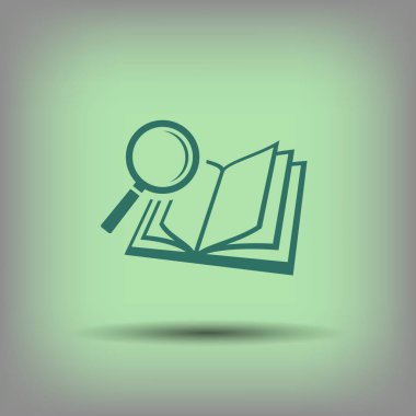 kitap ve büyüteç cam