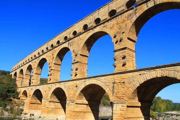 The Pont du Gard, an ancient Roman aqueduct that crosses the Gardon River in southern France