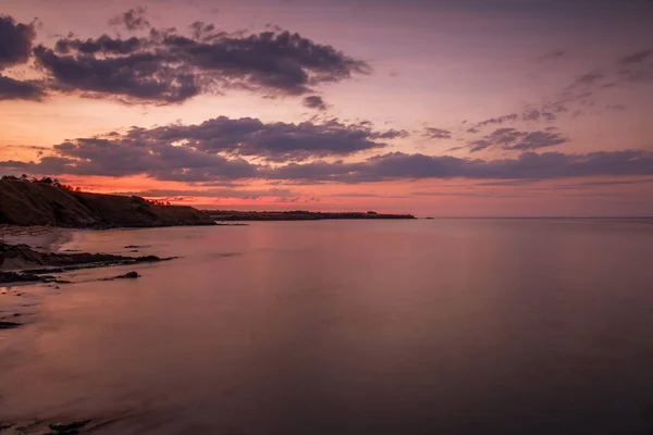 Puesta de sol y dramático conjunto de nubes —  Fotos de Stock