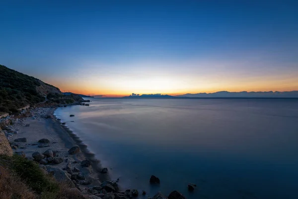 ギリシャのビーチに沈む夕日 — ストック写真