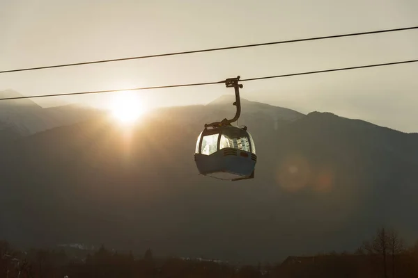 Ropeway and cablecar transport system for skiers.