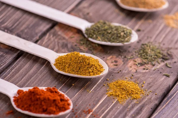 Set spices in measuring spoon. Cooking and seasoning for taste. — Stock Photo, Image