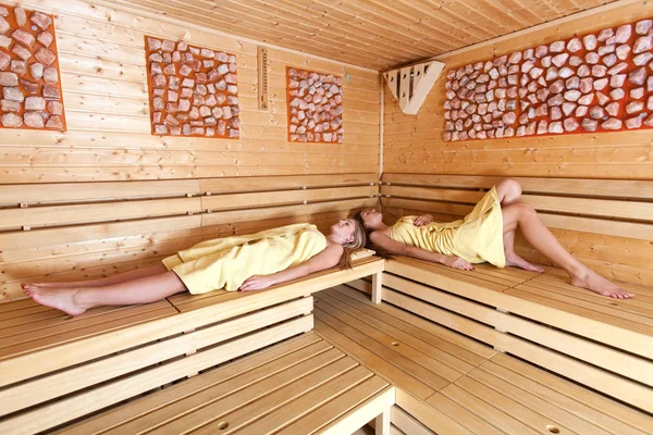 Beautiful women in a sauna.