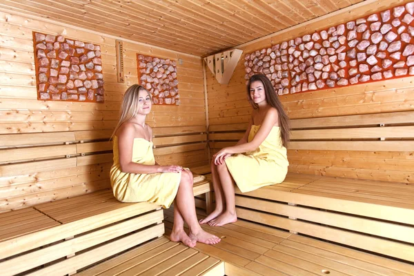 Beautiful women in a sauna.
