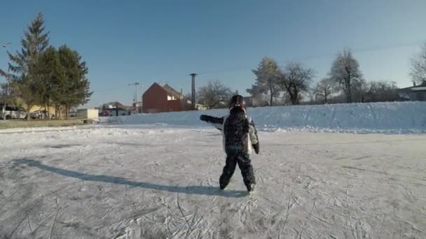 Little Boy Playing Hockey Child Learns Skate Shoot Stick — Stock Video