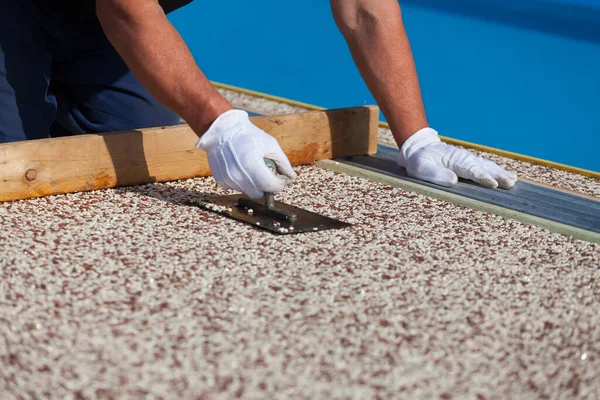 Worker Places Stone Carpet Resin — Stock Photo, Image
