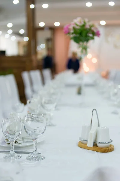 Serving of festive tables, Preparation for a festive dinner in a restaurant.