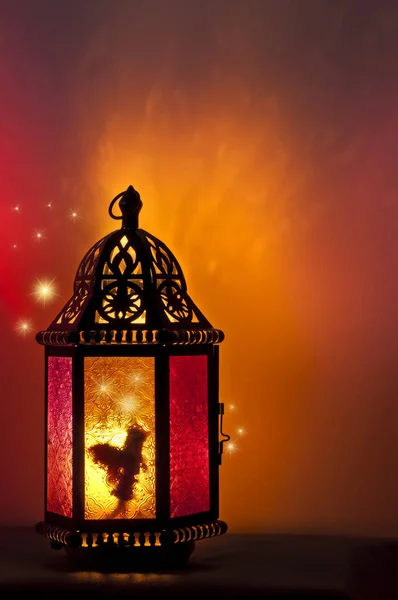 Fairy inside vintage Lantern lit by candlelight with a pattern of stars — Stock Photo, Image