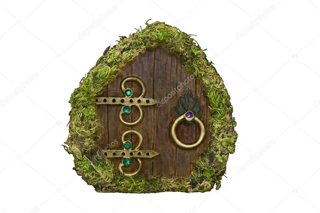 Fairy door with moss on isolated background