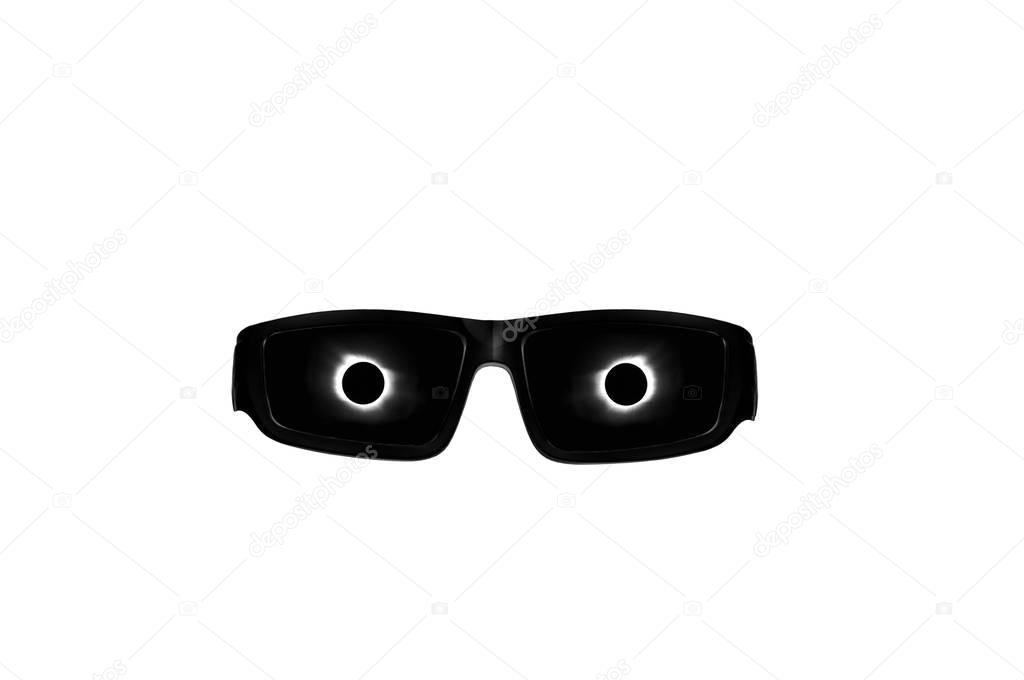 Solar Eclipse glasses with sun and moon corona reflecting in lenses