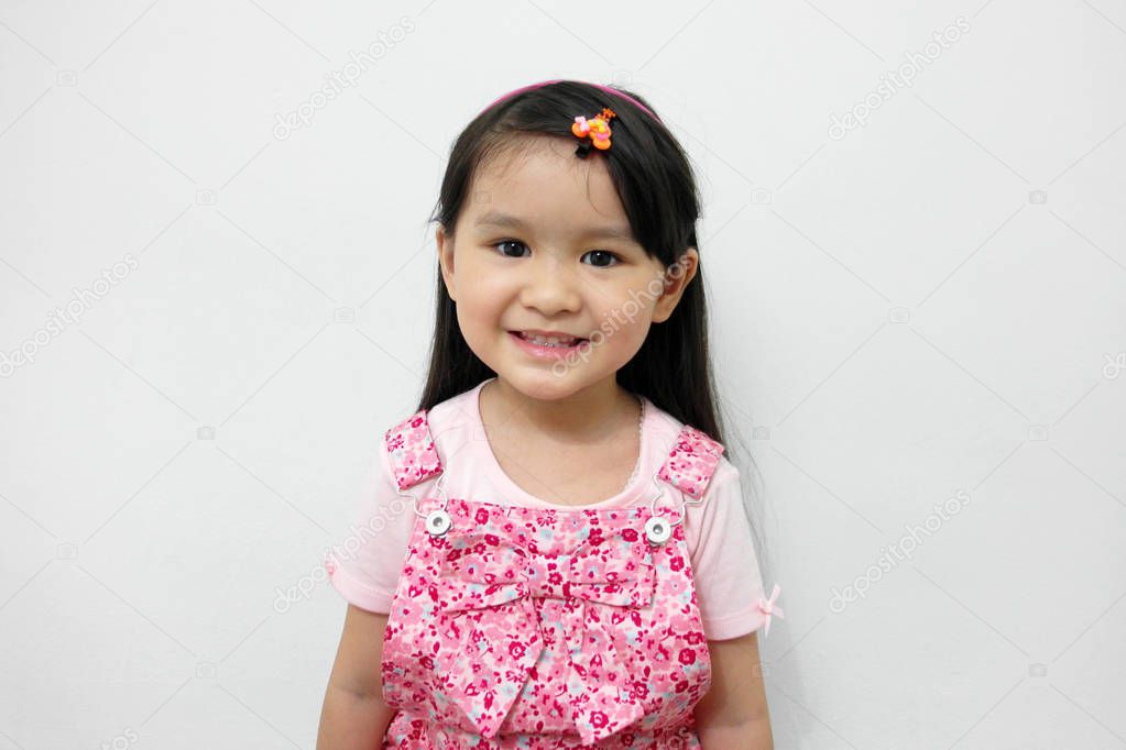 Cute little Asian girl smiling