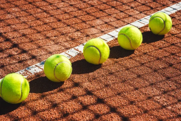 Tennis court line with balls