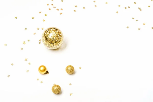 Gold Christmas balls on white background — Stock Photo, Image