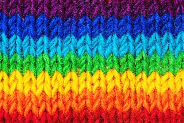 Háttér élénk pulóver minta szivárvány színek. — Stock Fotó