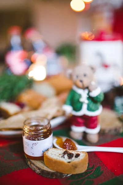 Festive dinner cake with jam on christmas decorated table