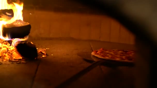 Baked pizza by in traditional vintage oven — Stock Video