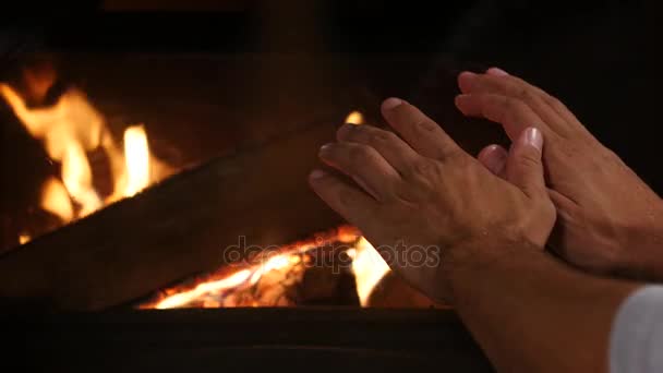 Man starts fire in fireplace — Stock Video